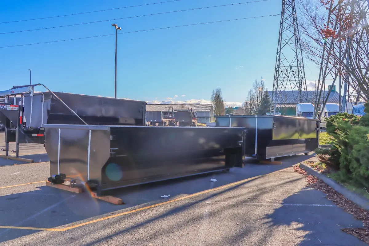 Roll-off dumpster ready for waste disposal at job site for 6 Yard Dumpster Rental in Navasota